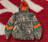 Supreme Mitchell & Ness NCAA Hooded Stadium Jacket Camo FW24
